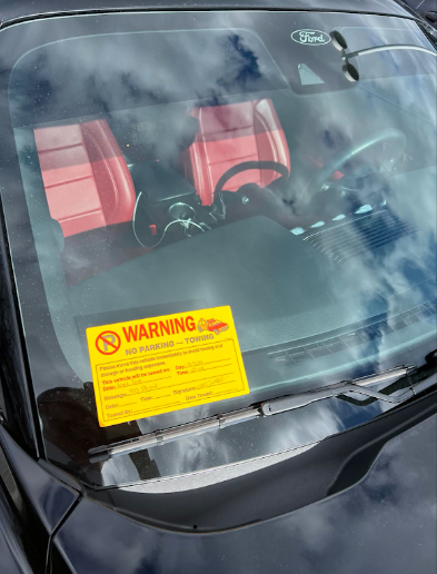 WCHS teacher Justin Ostry walked out of the building only to find a warning notice on his car despite it being parked in his assigned spot in the lot.