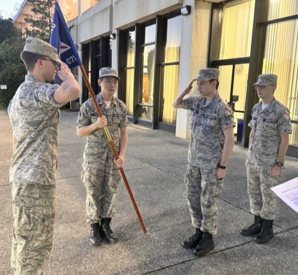 Civil Air Patrol (CAP) cadets at the BCC Squadron stand in formation and salute each other. Through CAP, cadets learn discipline, order and respect, important aspects of the military. 