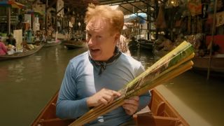 Conan OBrien makes a fool of himself while on a floating market in Bangkok, Thailand.        