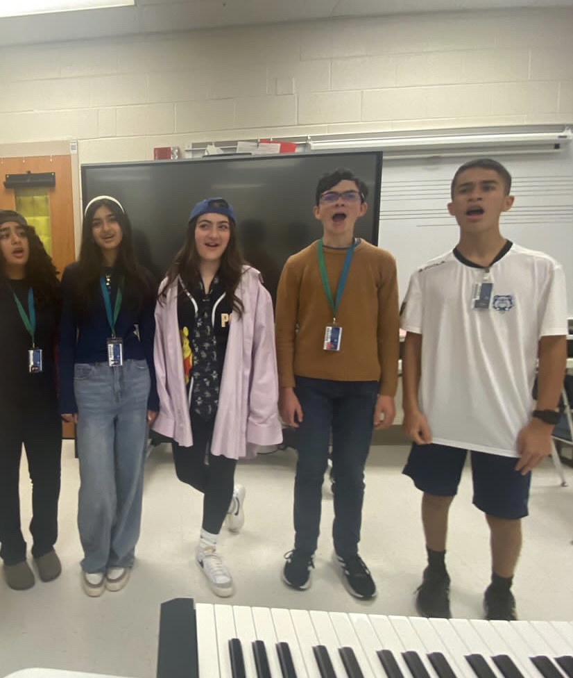 WCHS' newest chamber choir group "Camerata" rehearses for their upcoming debut at the Winter Choral Concert.