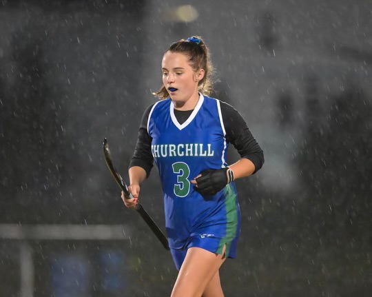 WCHS junior Nora O'Connor runs across the field during a Varsity Field Hockey Game against Magruder at the opposing high school on October 23.