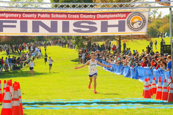 WCHS senior Nate Swanson crosses the finish line to become the first boy to win back-to-back cross country county championships for Churchill.	