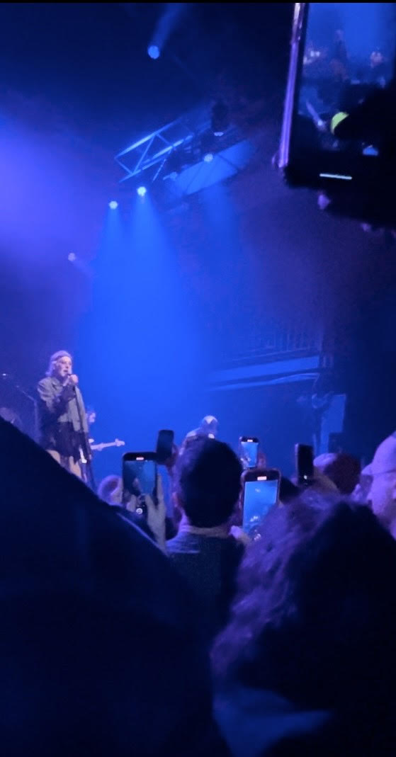 At pop singer Matisyahu's concert at the 9:30 Club on March 20, 2024, almost every audience member can be seen on their phones, watching him through the screen.	