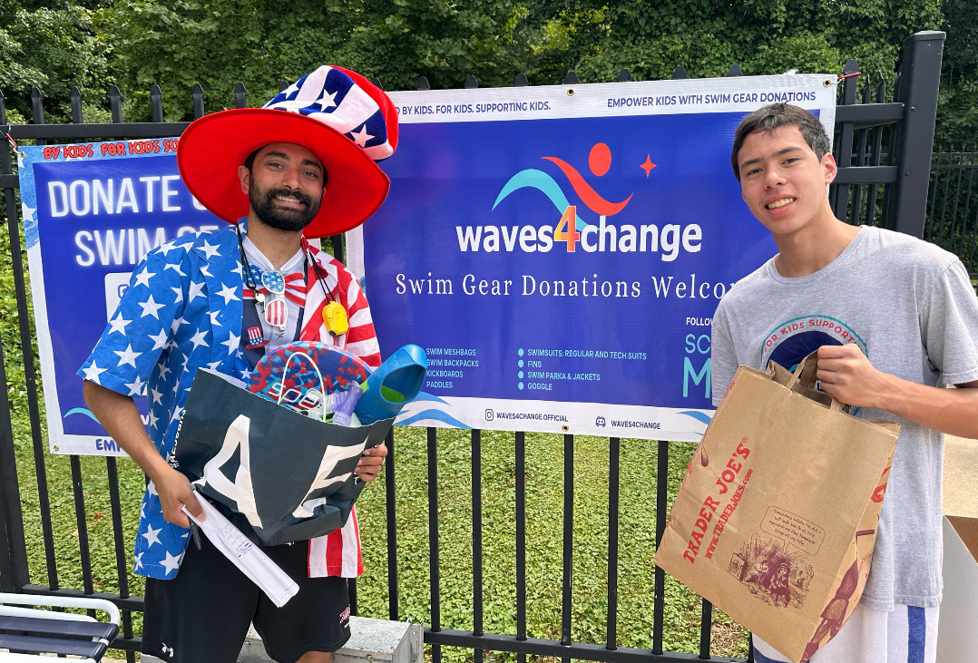 Waves4Change founder Maximus Devinney and donor Akshay Gandhi pose with their donations at a 2024 summer swim meet held at Country Glen Swim & Tennis Club.