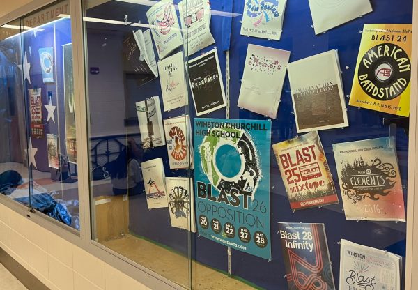 WCHS's annual themed concert Blast has run for a third of a century. Programs from across that period are on display outside the auditorium.