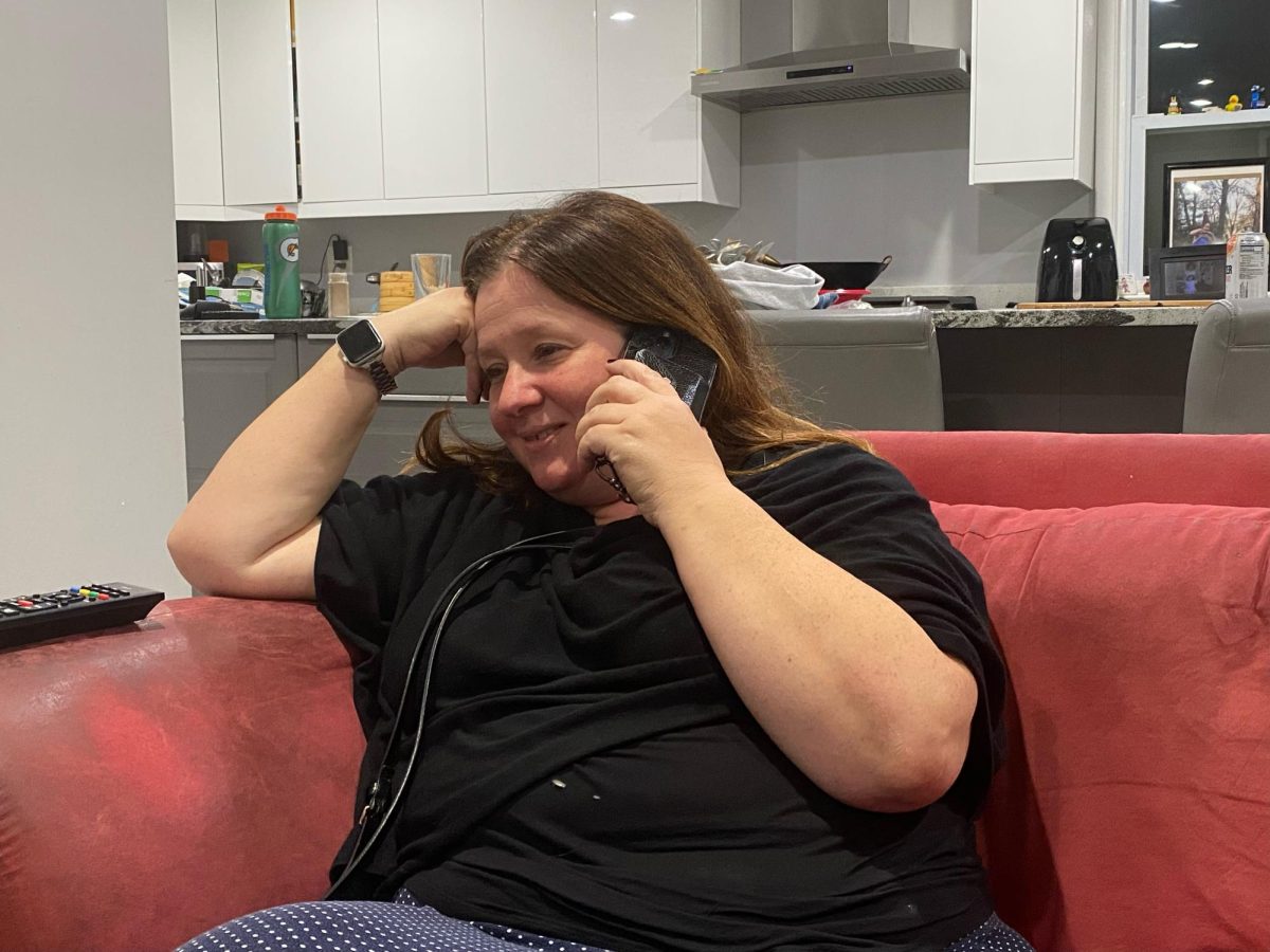 WCHS parent Natalie Billington listens to Principal Taylor's weekly phone call on Sunday, Nov. 3, 2024. In the phone call, Mr. Taylor reads over the key details from his Sunday newsletter including upcoming school events, holidays and reminders.