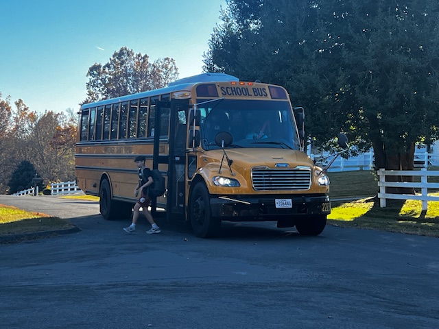 An electric bus drops off Herbert Hoover Middle School (HHMS) students on Nov. 8, 2024. MCPS has prioritized converting its vehicle fleet to electric as part of climate initiatives.