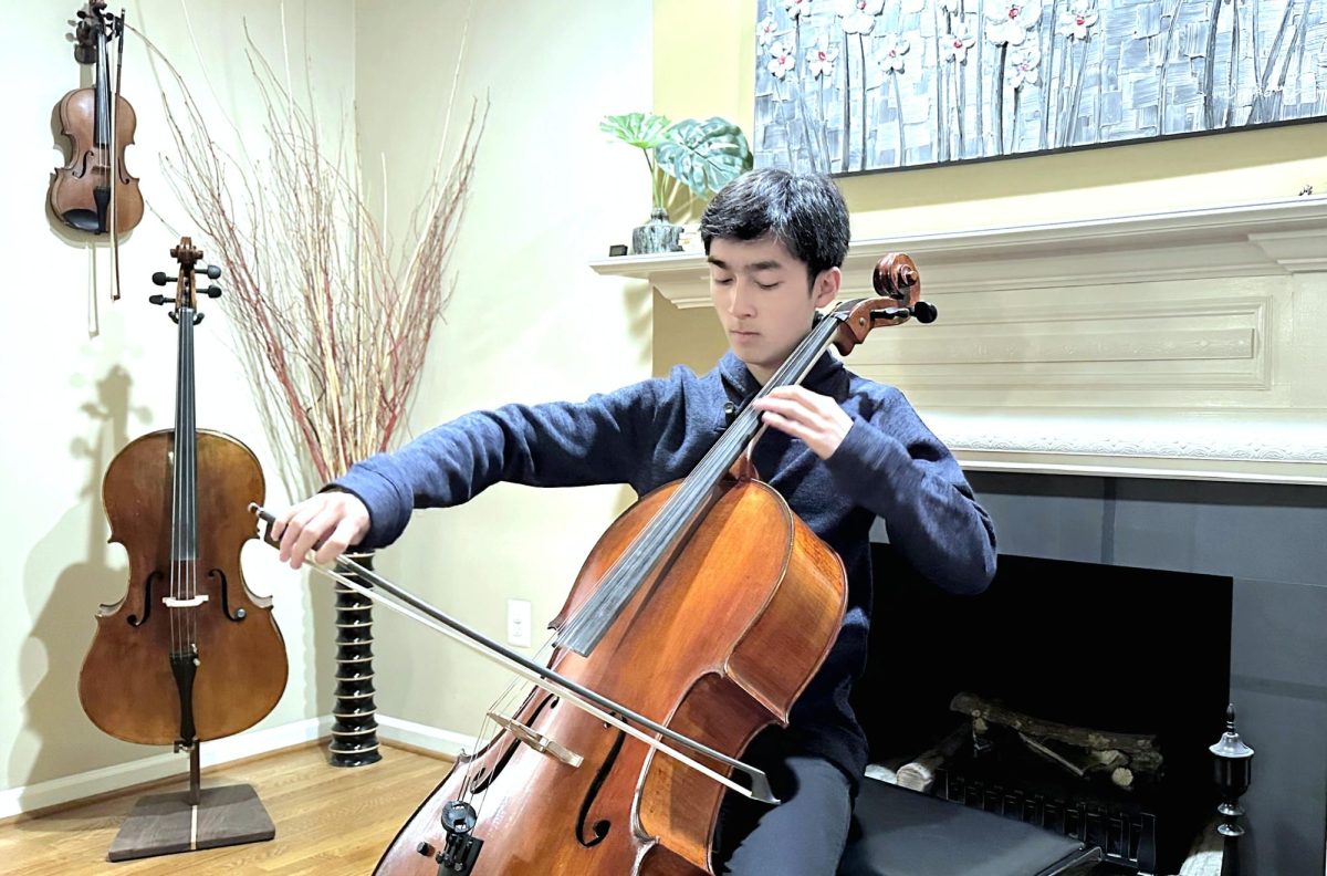 WCHS junior Huan Changvu sits in his living room practicing a piece for the WCHS Orchestra. Changvu also plays cello for the Maryland Classic Youth Orchestra and the TACY foundation in his free time.