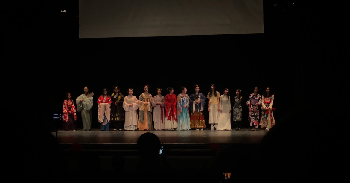 Student models step out onto the stage for a final applause to the traditional-wear fashion show. They represent various eras and dynasties to ring in the Year of the Snake.