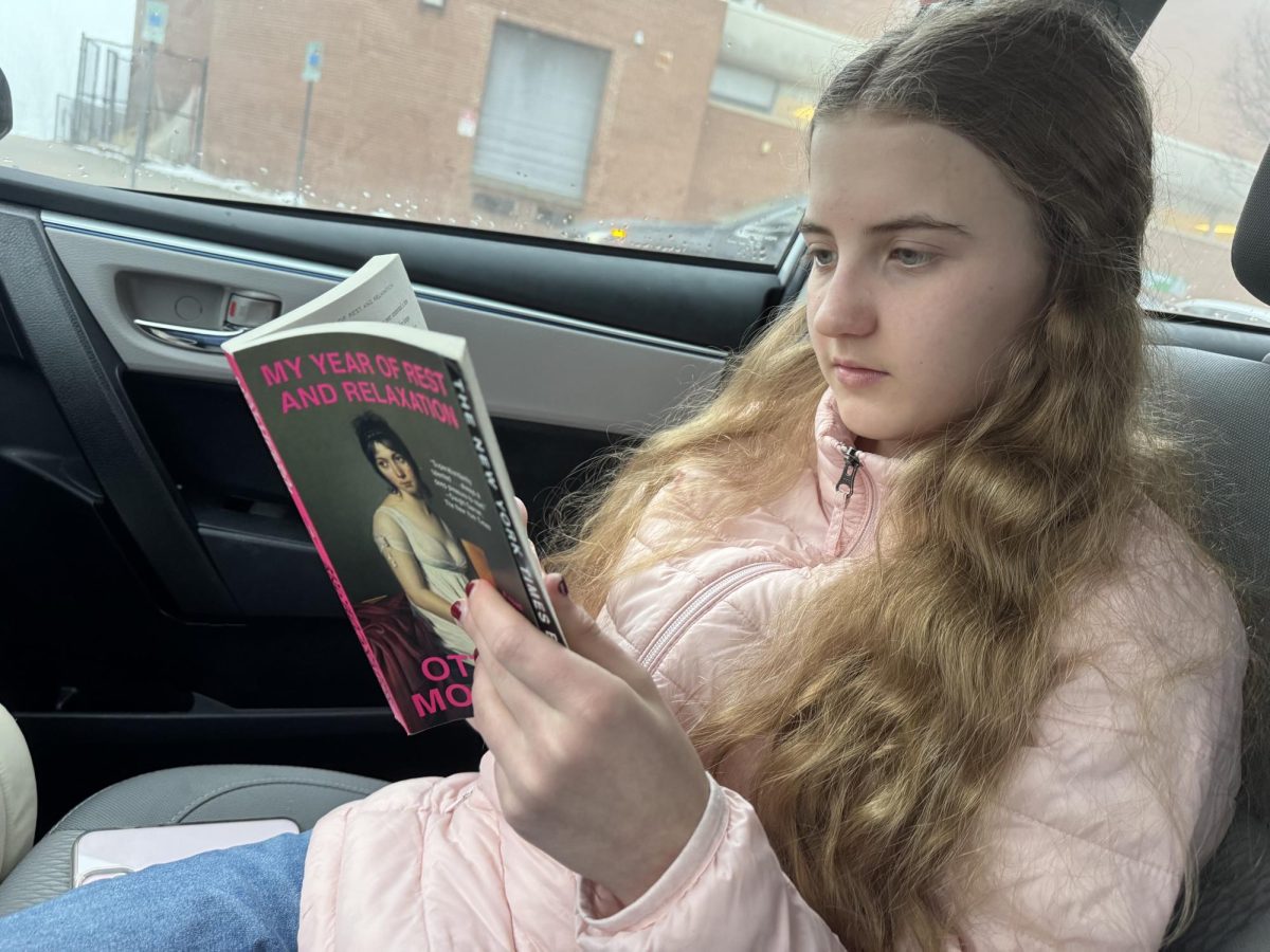 WCHS freshman Ava Dean reads "My Year of Rest and Relaxation" by Ottessa Moshfegh. This is one of the books that originally  became popular on BookTok. Recently, new problems have arisen with the platform. 