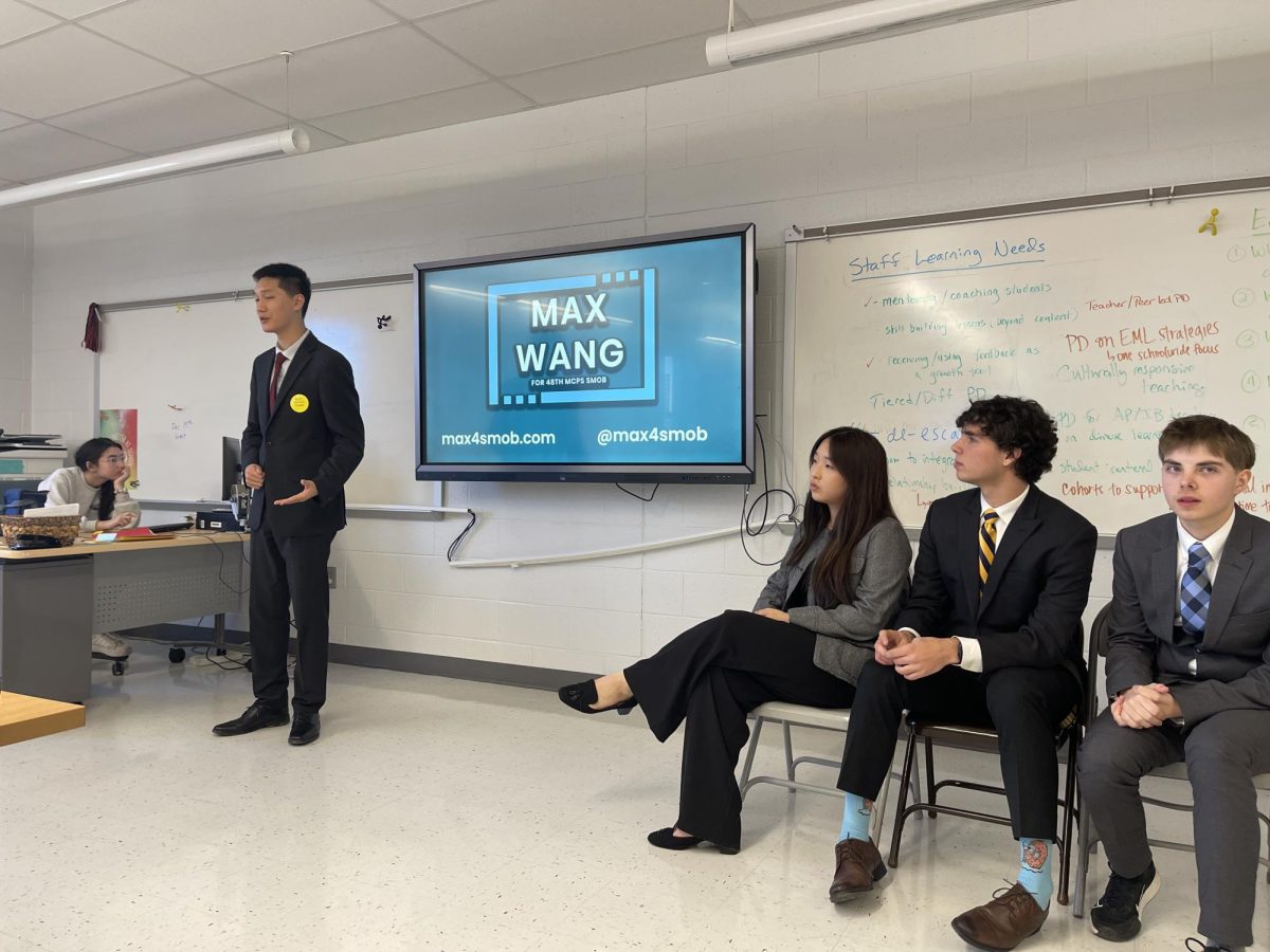 WCHS junior and MCPS SMOB candidate Max Wang gives a speech and meets students at Springbrook High School's "Meet the Candidates" event.	